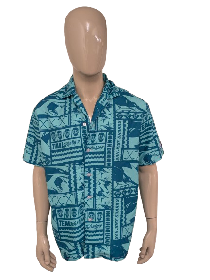 San Jose Sharks short sleeve print shirt. Green print. Size XL.