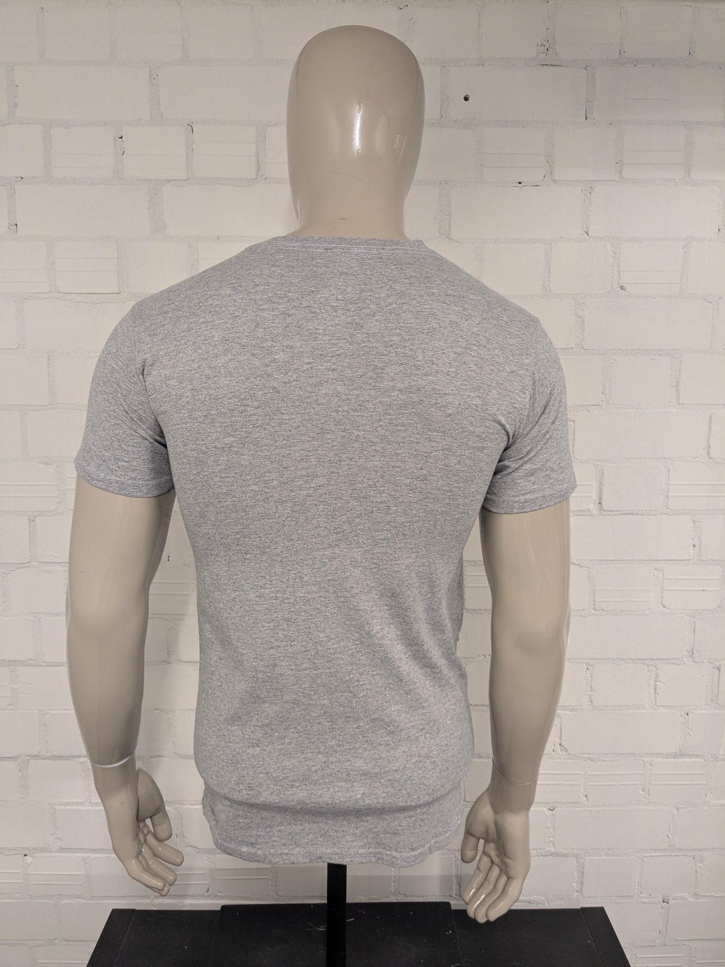 UBS World Series Champions Shirt. Gray with print. Size S.