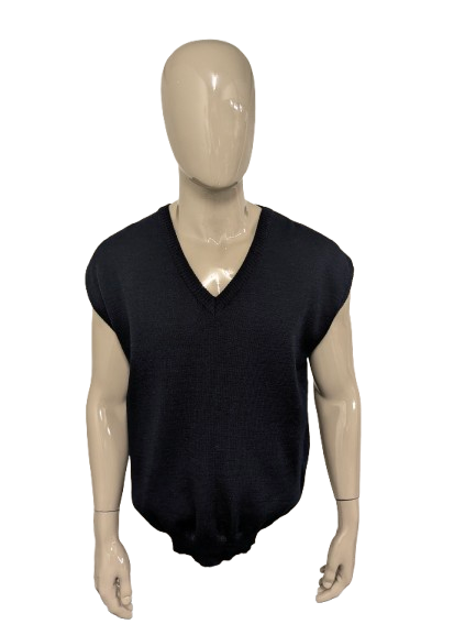 Wollen spencer met V-Hals. Donker Blauw gekleurd. Maat XL.