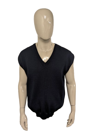 Wollen spencer met V-Hals. Donker Blauw gekleurd. Maat XL.