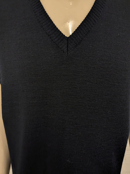 Wollen spencer met V-Hals. Donker Blauw gekleurd. Maat XL.