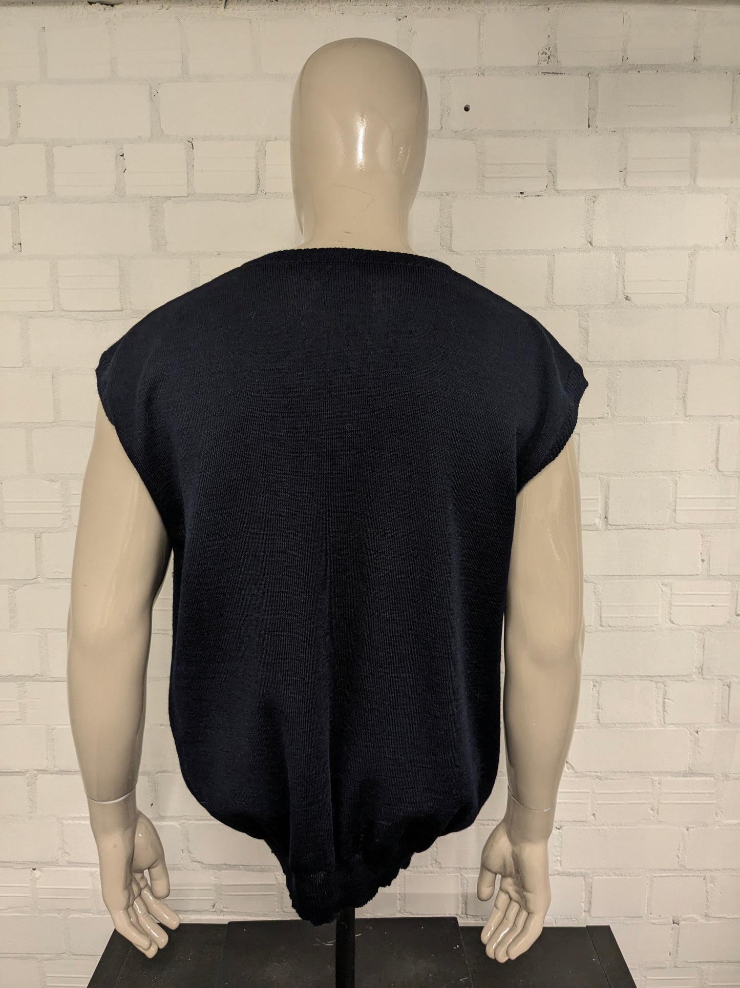 Wollen spencer met V-Hals. Donker Blauw gekleurd. Maat XL.