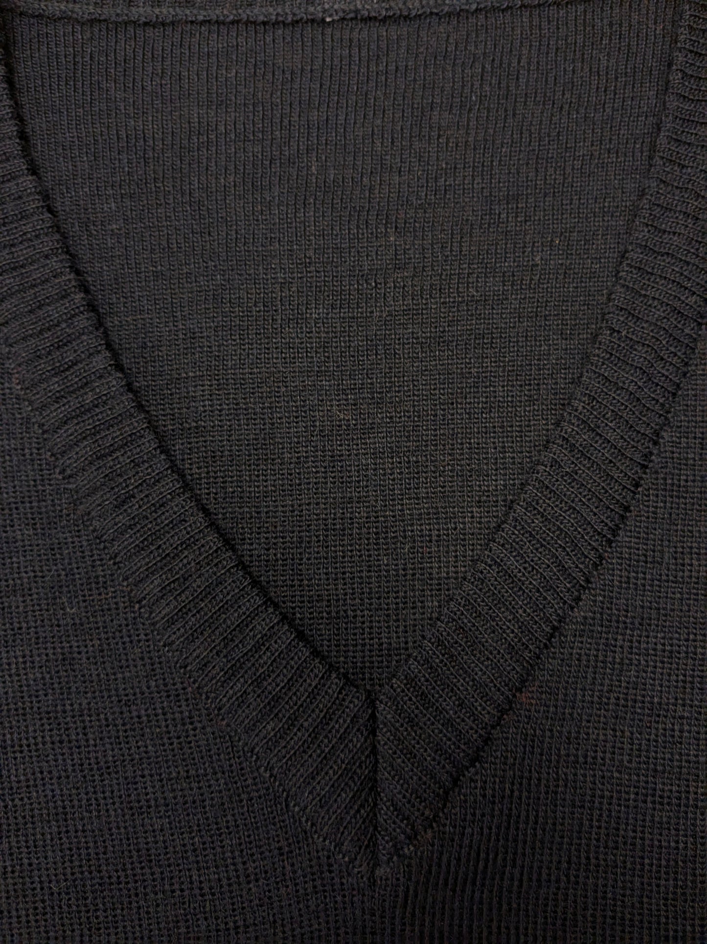 Wollen spencer met V-Hals. Donker Blauw gekleurd. Maat XL.