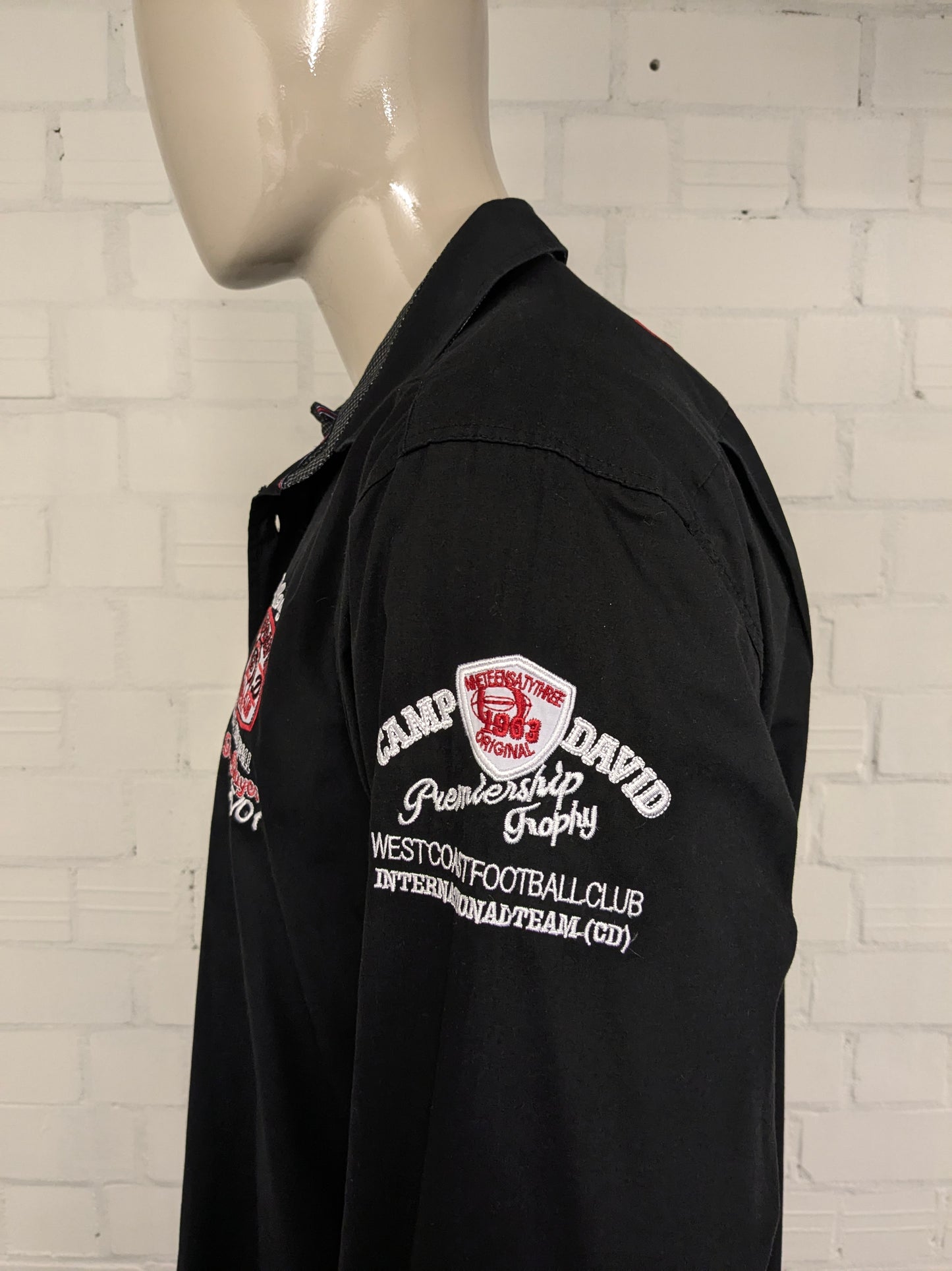 Camp David shirt. Black with different applications. Size XL.