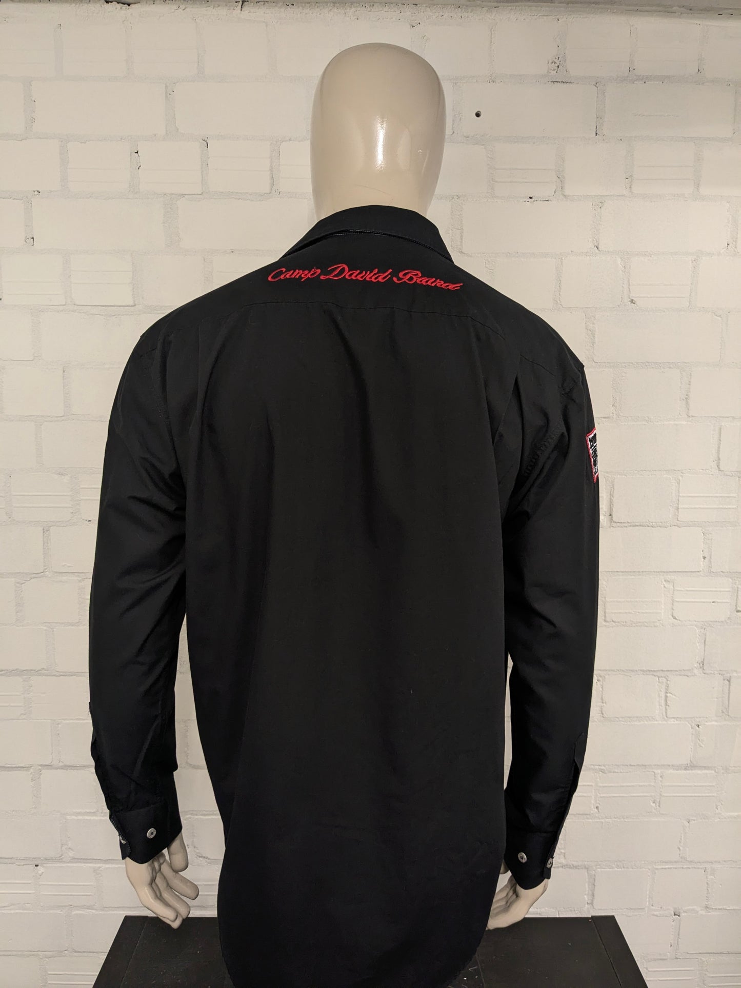 Camp David shirt. Black with different applications. Size XL.