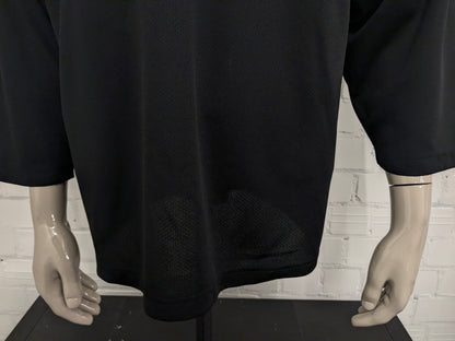 Oshawa Ringette sport longsleeve met V-Hals. Zwart met opdruk. Oversized S / M.