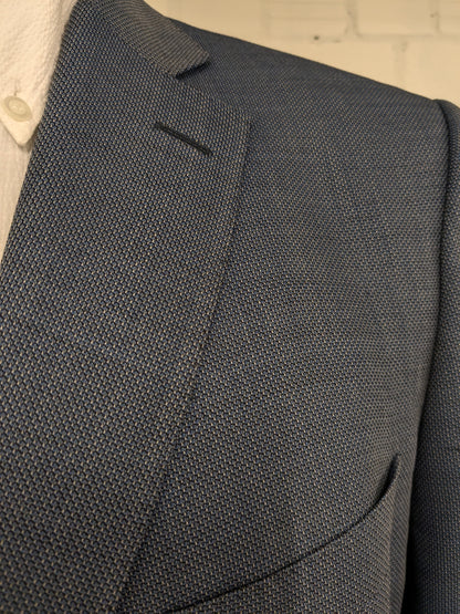 Eduard Dressler Wolljacke. Super 100. Blaugrau gemischt. Größe 26 (52 / l).