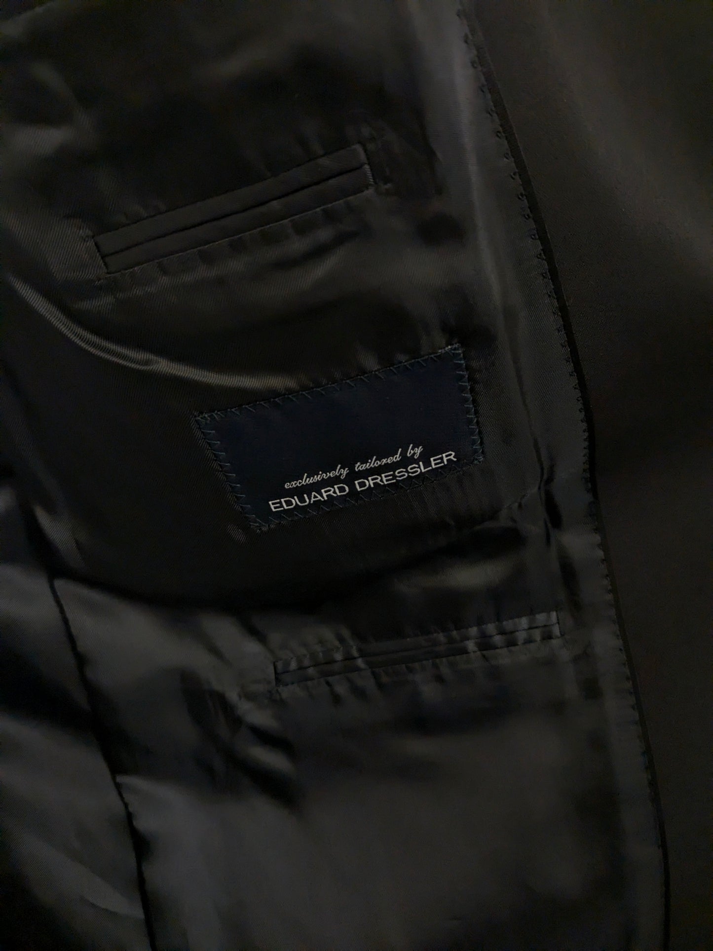 Eduard Dressler Vintage Colbert. Dark blue with gold -colored knots. Size 26 (52 / L).