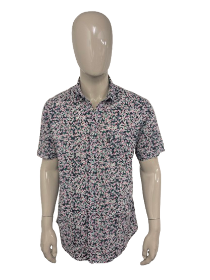 Shirt Shirt RVCA manica corta. Fiori verdi grigi rosa stampata. Taglia XL.