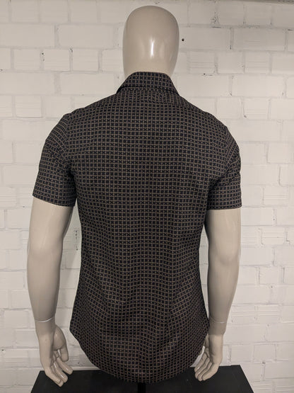 Sleeve corta Vintage P Tarassis e Son. Stampa marrone nero. Taglia M.