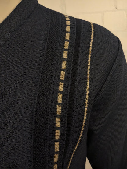 Suéter de lana de Luigi Luigi Luigi con cuello en V. Blue beige de color negro. Tamaño L. 50% de lana.