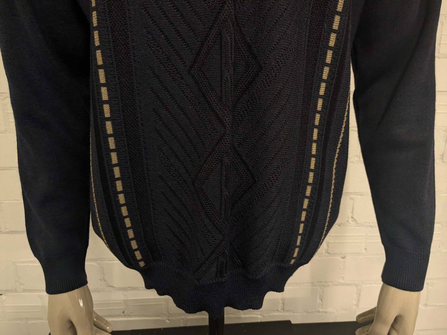 Suéter de lana de Luigi Luigi Luigi con cuello en V. Blue beige de color negro. Tamaño L. 50% de lana.