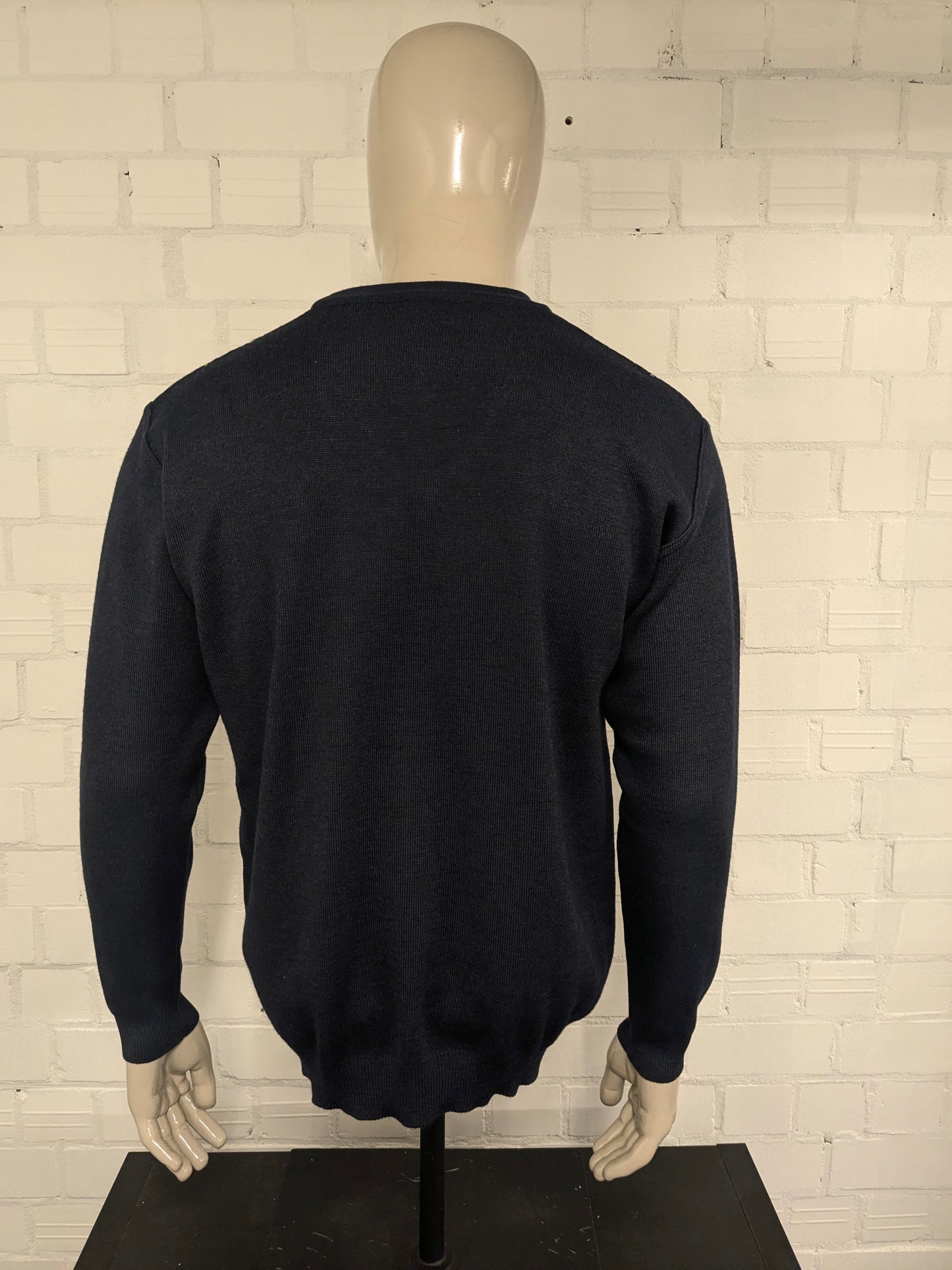 Suéter de lana de Luigi Luigi Luigi con cuello en V. Blue beige de color negro. Tamaño L. 50% de lana.