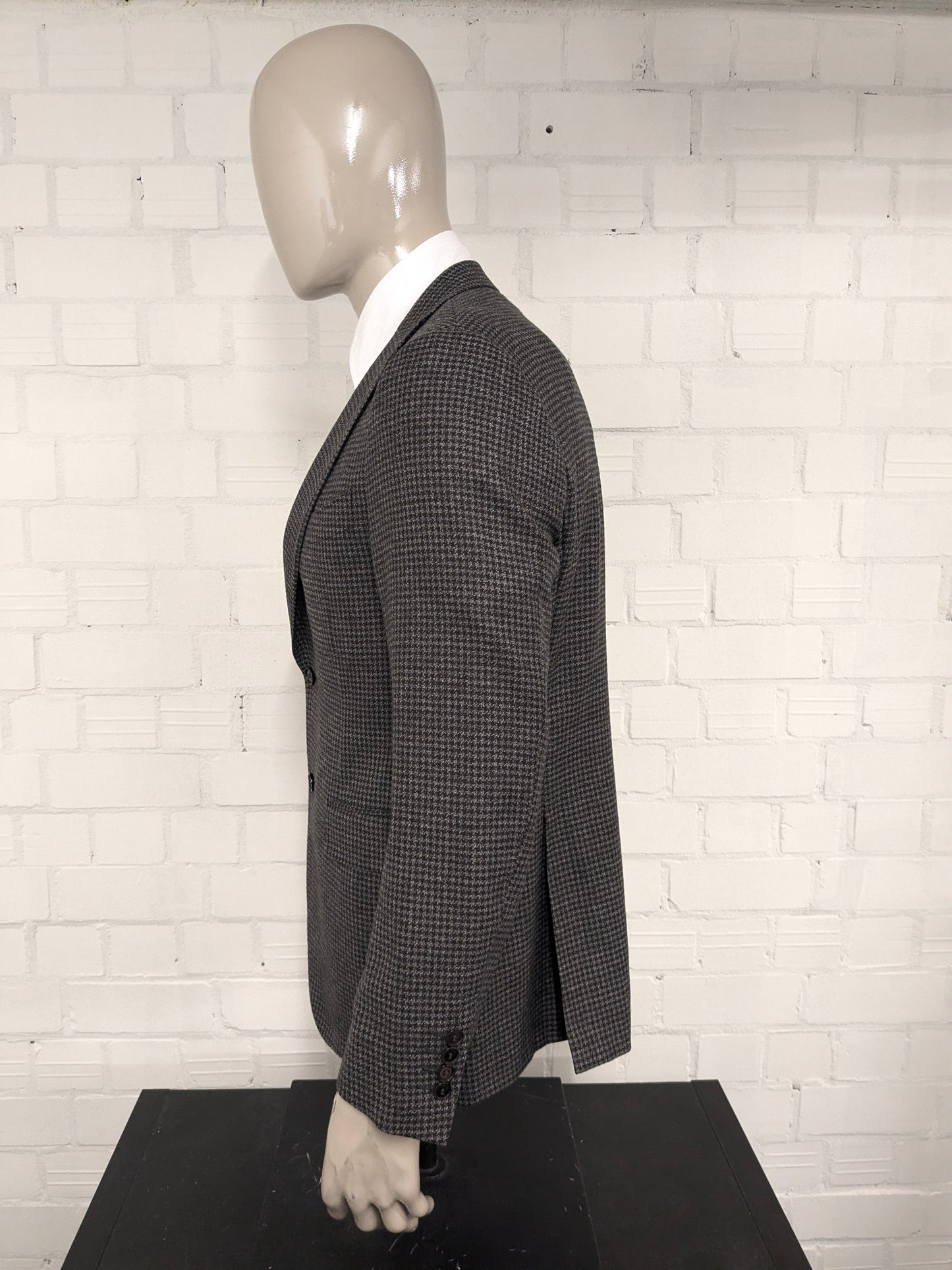 Canali vuole la giacca. Motivo grigio marrone. Dimensione 52 / L.