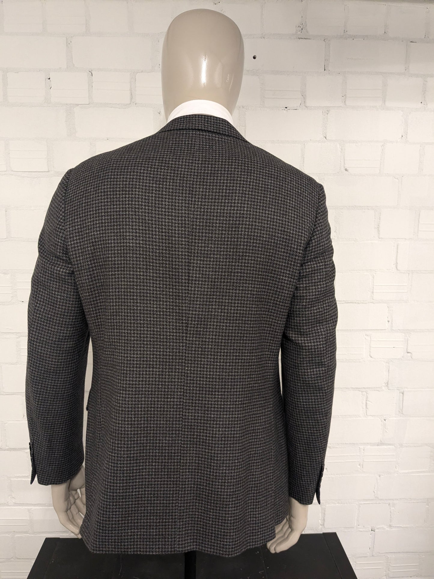 Canali vuole la giacca. Motivo grigio marrone. Dimensione 52 / L.