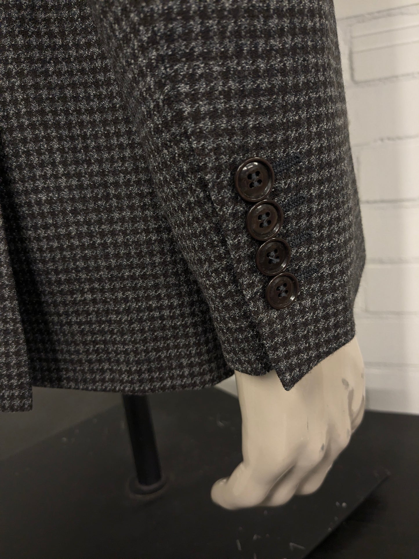 Canali vuole la giacca. Motivo grigio marrone. Dimensione 52 / L.