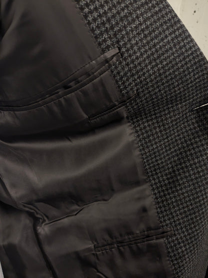 Canali vuole la giacca. Motivo grigio marrone. Dimensione 52 / L.