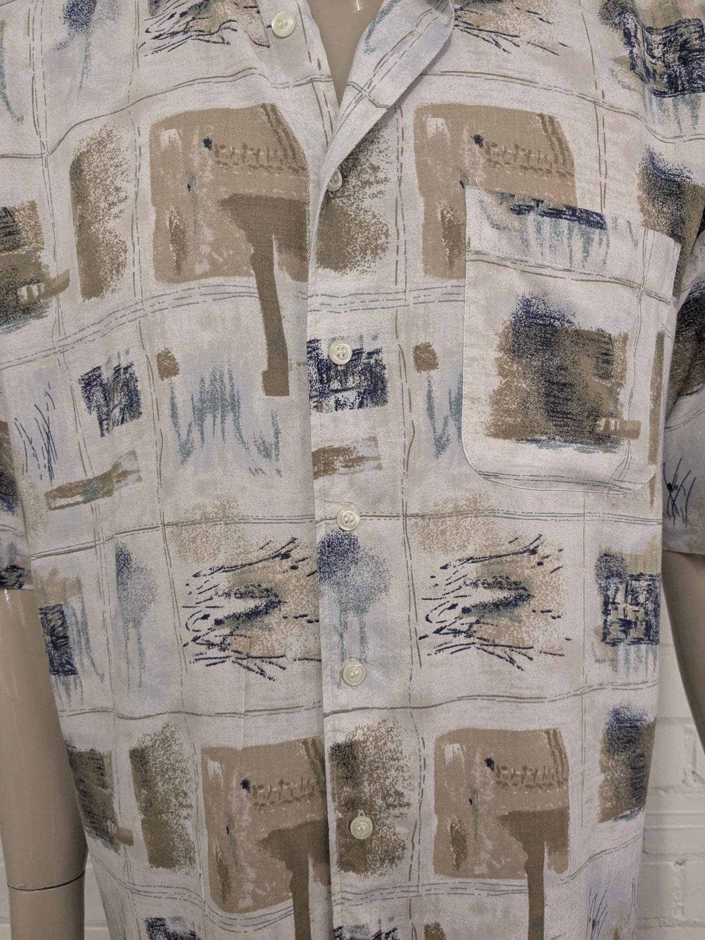 Vintage Cela Cela Cela Cela Manga corta. Impresión azul verde beige. Tamaño xl.