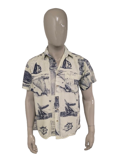 Vintage Pacific Ocean Shirt Kurzarm. Gelbblaudruck. Größe L.
