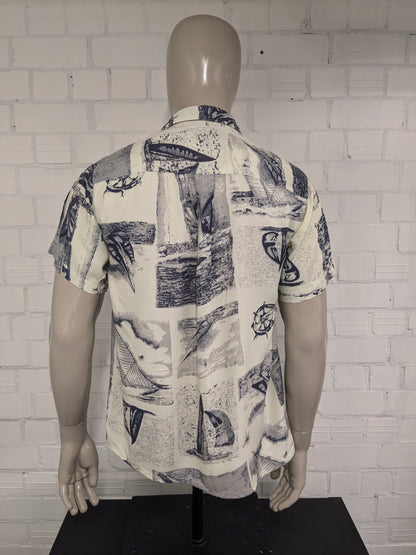 Vintage Pacific Ocean Shirt Kurzarm. Gelbblaudruck. Größe L.