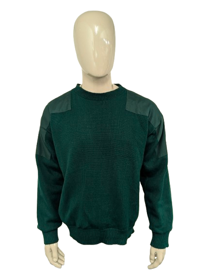 Pull de pluie vintage Eau et pull de golf à travers le vent. Vert coloré. Taille xl.