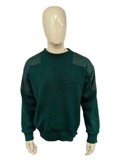 Pull de pluie vintage Eau et pull de golf à travers le vent. Vert coloré. Taille xl.