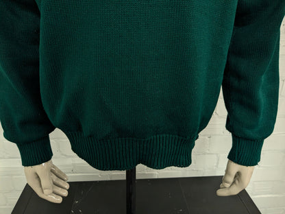 Pull de pluie vintage Eau et pull de golf à travers le vent. Vert coloré. Taille xl.