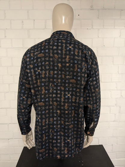 Vintage Signum shirt with large buttons. Black brown blue print. Size XL.
