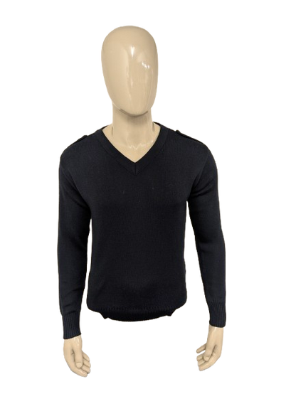 Pull en laine avec col en V. Bleu foncé avec applications d'épaule. Taille L. 60% de laine.