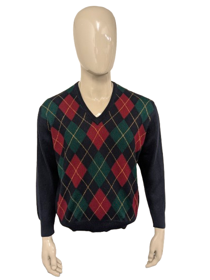 Maglione vintage in lana merino con scollo a V. Motivo argyle giallo verde rosso. Dimensione L. 50% lana.