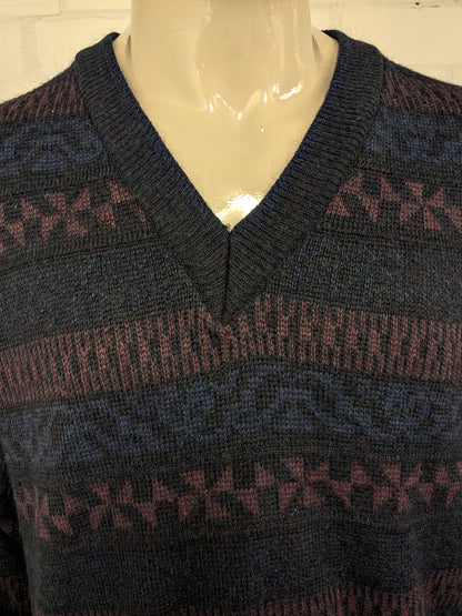 Suéter de lana Angelo litrico vintage con cuello en V. Color negro púrpura de color negro. Tamaño L. 20% de lana.