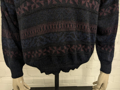 Suéter de lana Angelo litrico vintage con cuello en V. Color negro púrpura de color negro. Tamaño L. 20% de lana.