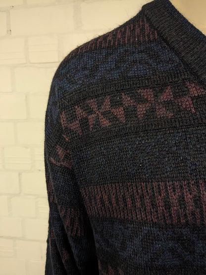 Suéter de lana Angelo litrico vintage con cuello en V. Color negro púrpura de color negro. Tamaño L. 20% de lana.