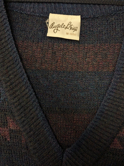Suéter de lana Angelo litrico vintage con cuello en V. Color negro púrpura de color negro. Tamaño L. 20% de lana.