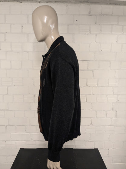 Pull Polo en laine Breidhof vintage. Couleur marron noir. Taille 2xl / xxl. 50% de laine.