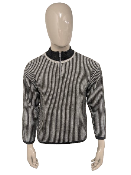 Pull en laine d'araignée vintage avec fermeture éclair. Gris blanc rayé. Taille M. 50% de laine.