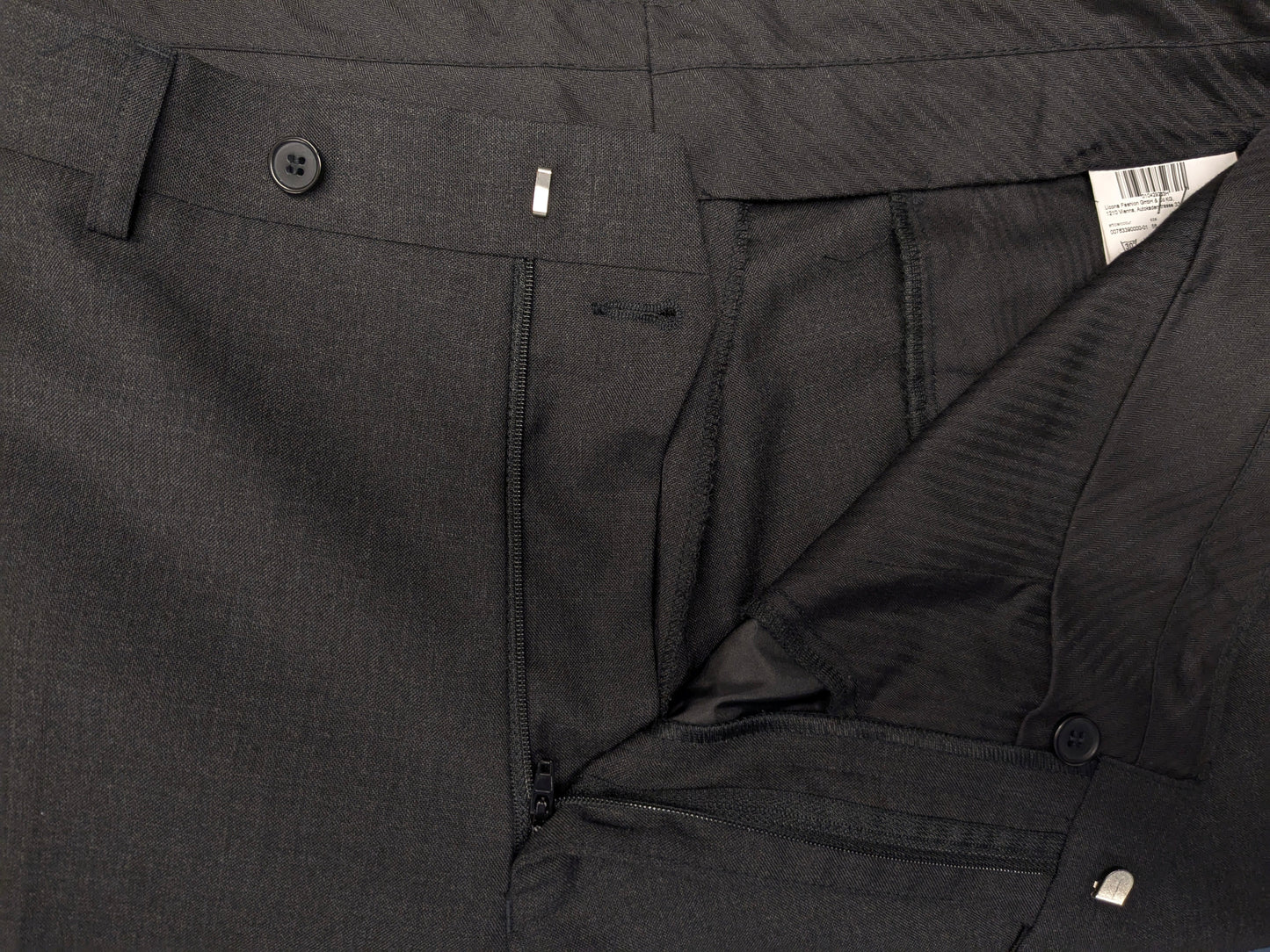 Pantalon en laine licona. Gris foncé mélangé. Taille 56 / XL.