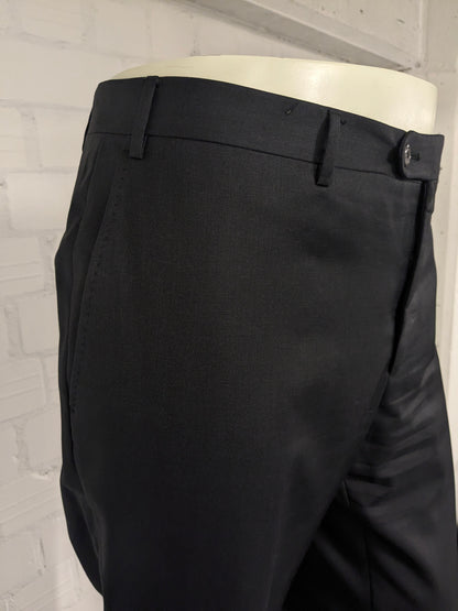 Pantaloni di lana corneliani. Colorato grigio scuro. Dimensione 26 (52/L).