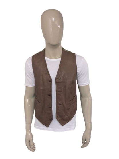 Giuta di cuoio vintage. Colorato marrone. Taglia M.