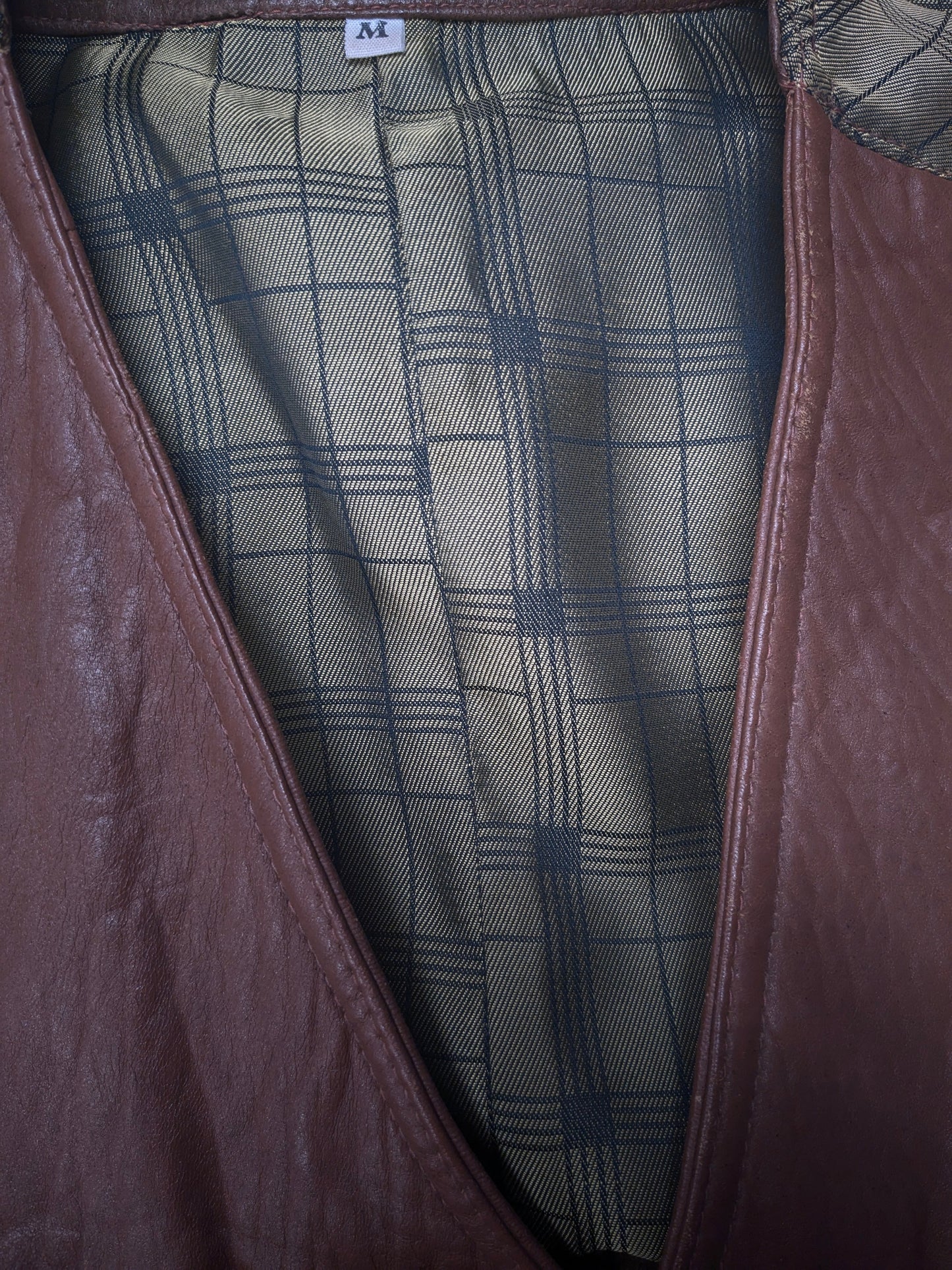 Giuta di cuoio vintage. Colorato marrone. Taglia M.