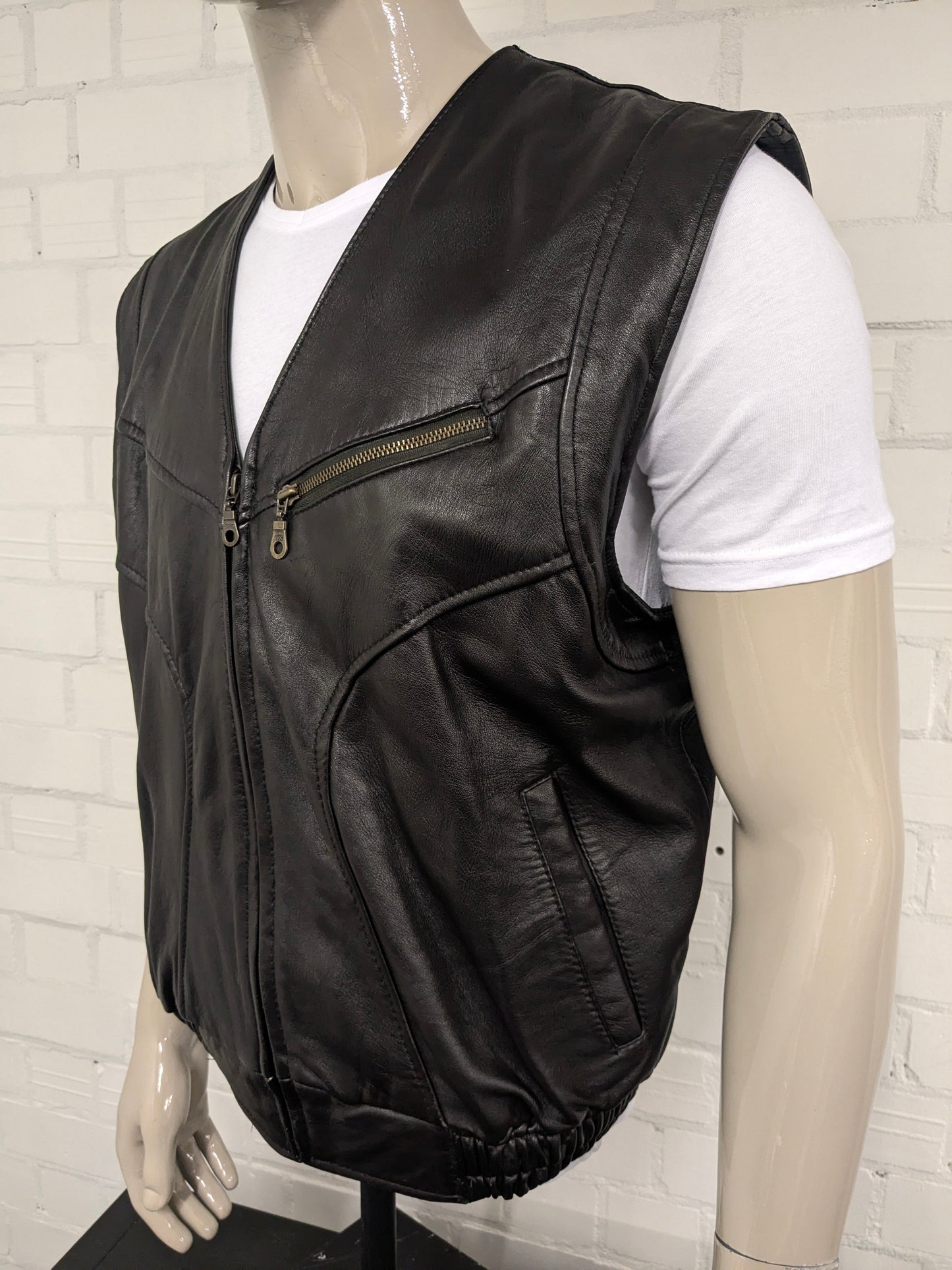 Chaussure de corps en cuir à double face vintage avec 1 poche intérieure. Couleur brun foncé. Taille xl.