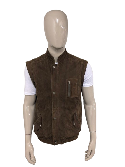 Vintage McNeal dubbelzijdig suède bodywarmer met dubbele sluiting. Bruin gekleurd. 2 binnenzakken. Maat L.