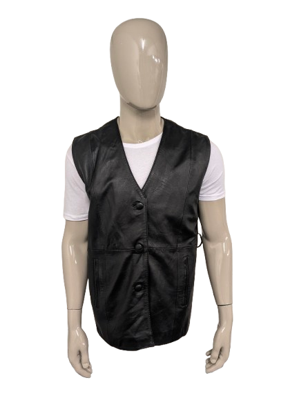 Vintage dubbelzijdig leren gilet. Zwart gekleurd. Langer model. (riem ontbreekt). Maat XL.