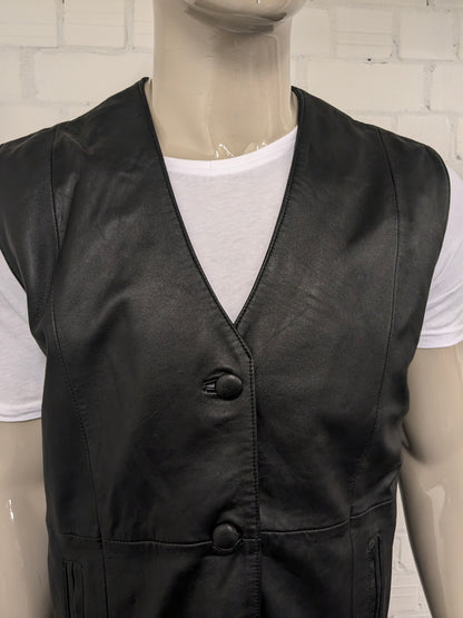 Vintage dubbelzijdig leren gilet. Zwart gekleurd. Langer model. (riem ontbreekt). Maat XL.