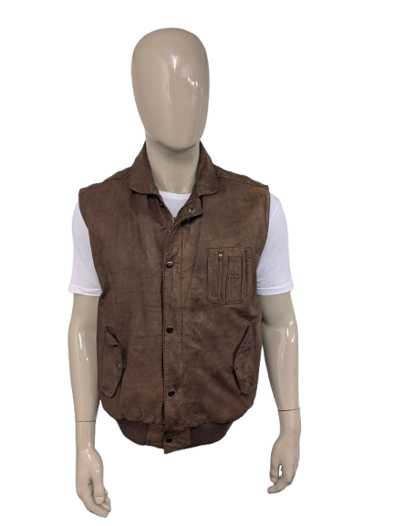 Chaussure de corps à double version en cuir vintage avec double fermeture et 1 poche intérieure. De couleur marron.  Taille xl.