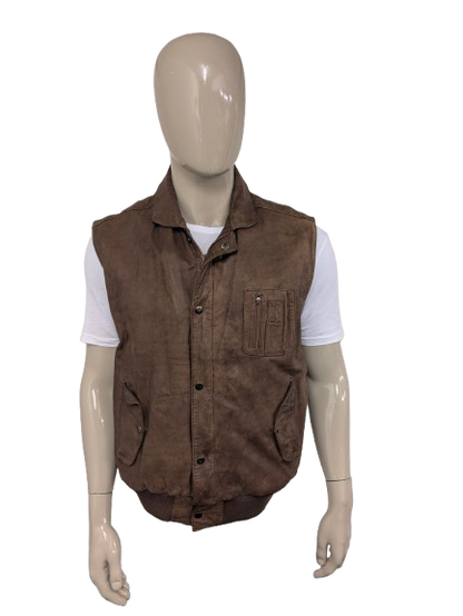 Chaussure de corps à double version en cuir vintage avec double fermeture et 1 poche intérieure. De couleur marron.  Taille xl.