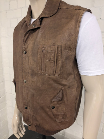 Chaussure de corps à double version en cuir vintage avec double fermeture et 1 poche intérieure. De couleur marron.  Taille xl.