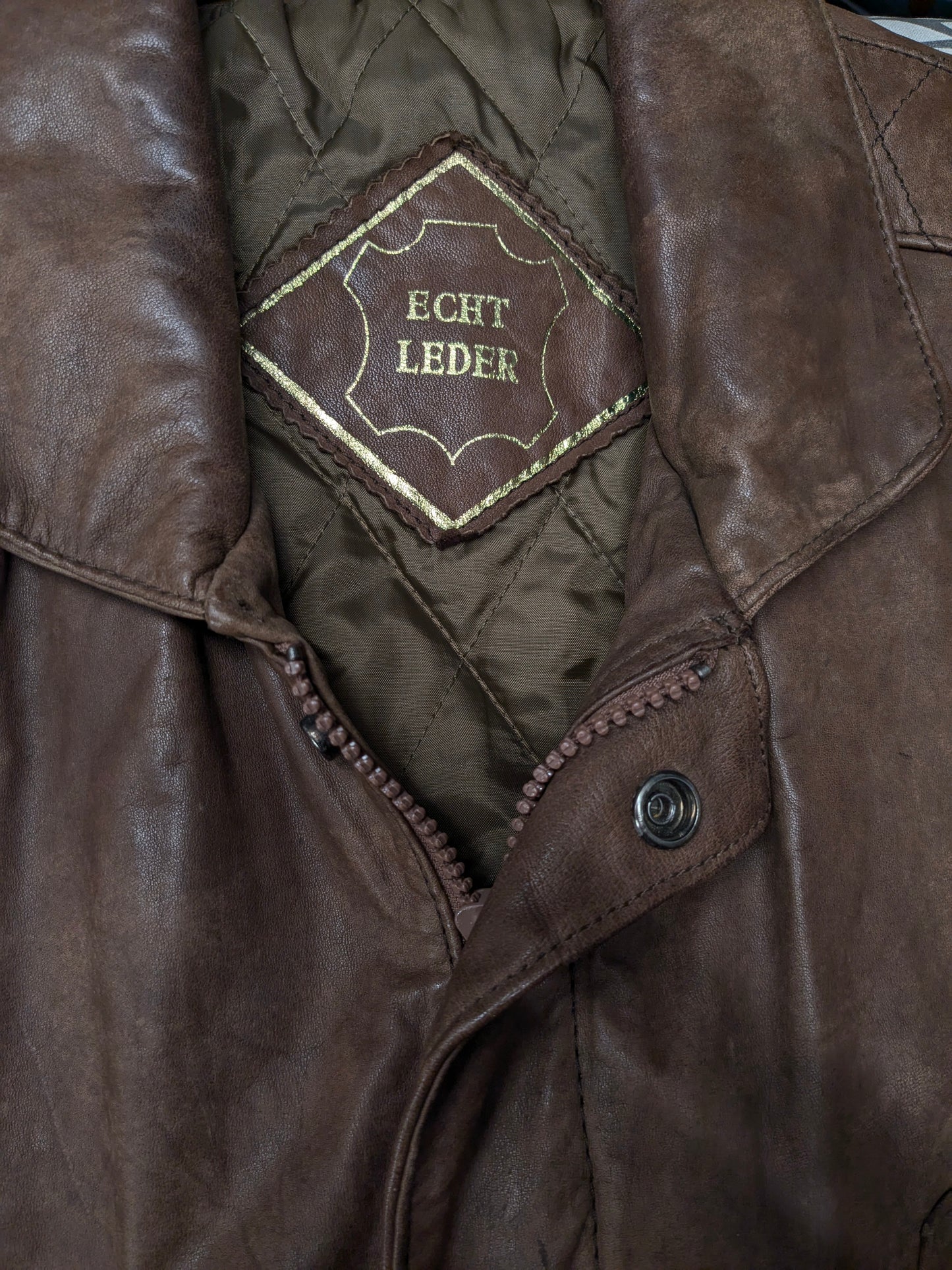 Chaussure de corps à double version en cuir vintage avec double fermeture et 1 poche intérieure. De couleur marron.  Taille xl.