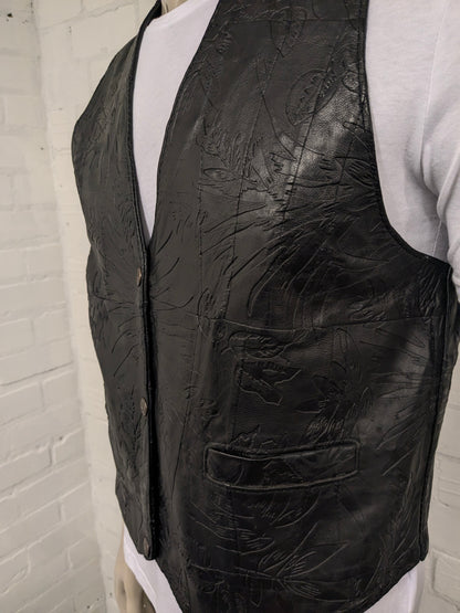 Vintage leren dubbelzijdig gilet met drukknopen. Zwart voelbaar bladmotief. Maat M.