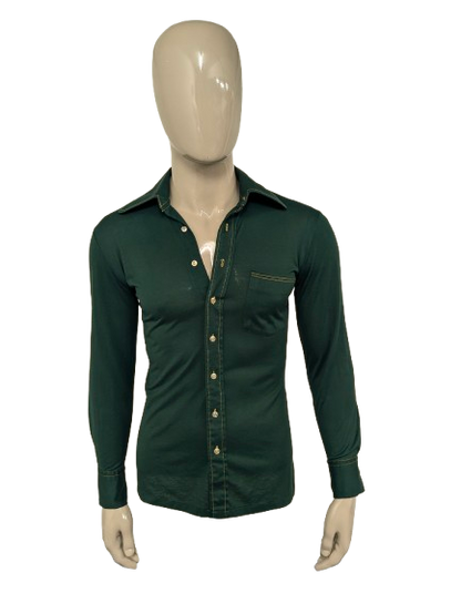 Vintage 70's paramout shirt with a round pointed collar. Green with yellow stitching. Size S. Stretch.